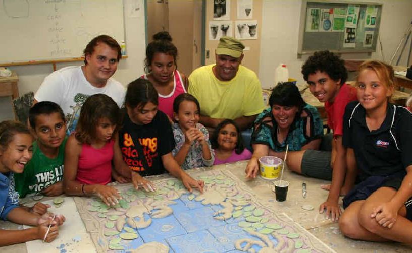 Members of the Gumbaynggirr community marked NAIDOC Week by creating a mural. Members of the Gumbaynggirr community marked NAIDOC Week by creating a mural.